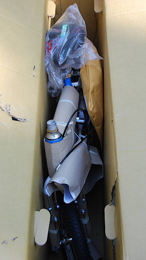 Woom bike packed tightly in the box