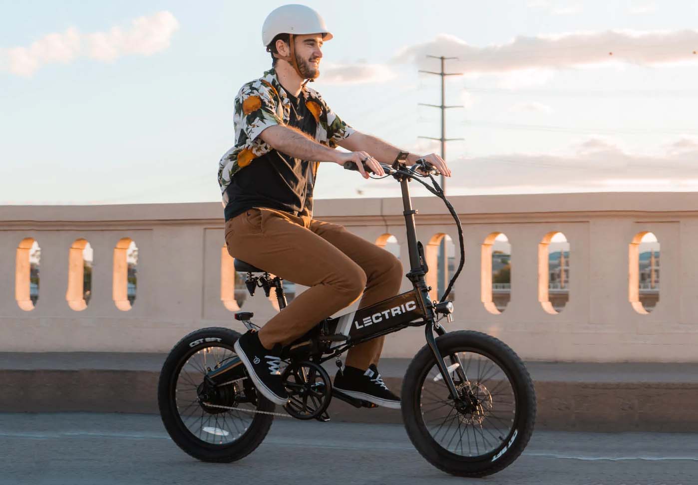 man riding black lectric xp lite