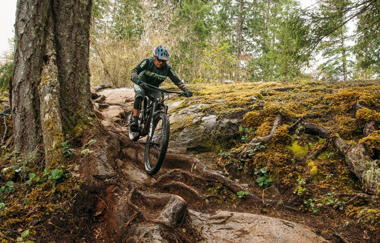 older man riding best electric mountain bike