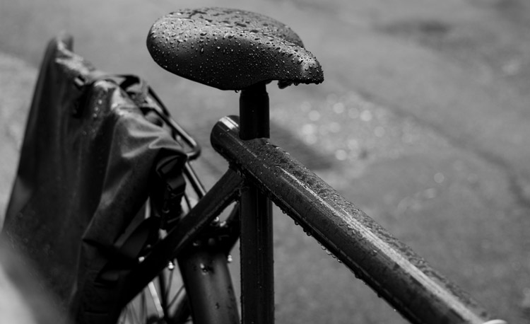 black electric bike in the rain