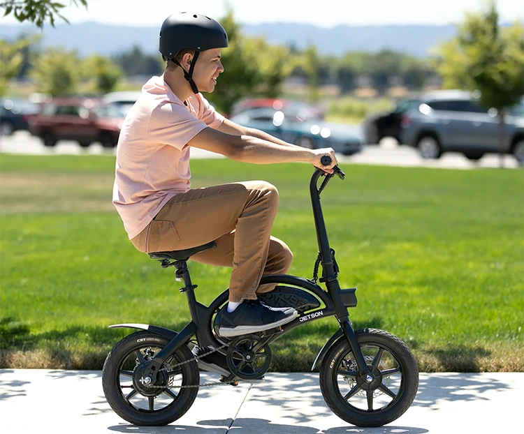 man riding jetson bolt pro ebike in a park