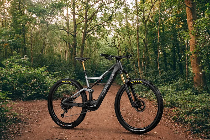 orbea rise on a forest trail