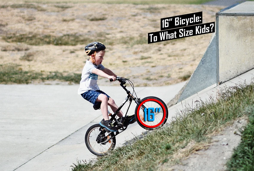 boy riding a 16-inch kids bicycle up a concrete hill