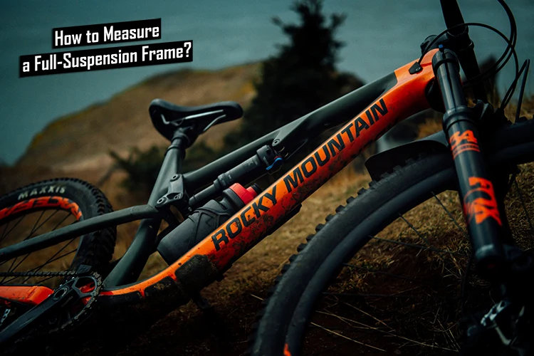 orange and black full suspension mountain bike