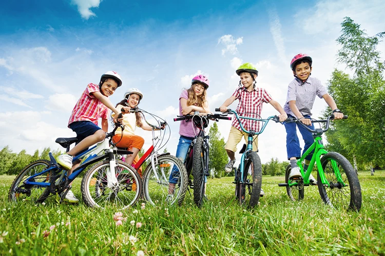 children riding kids bikes