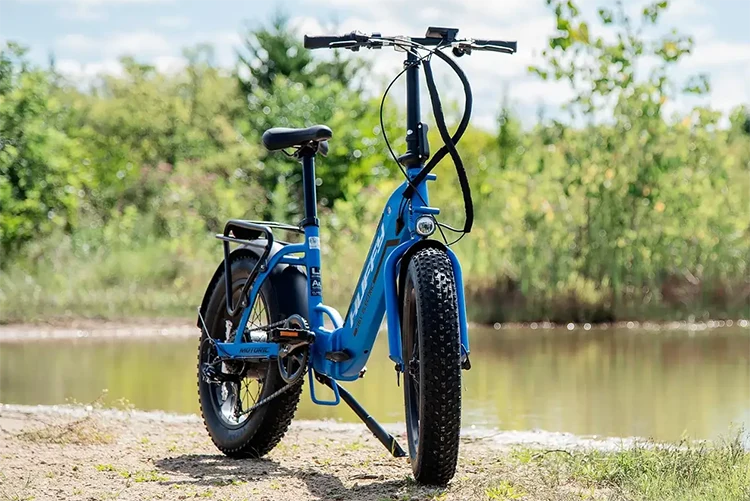 front view of a blue huffy electric bike
