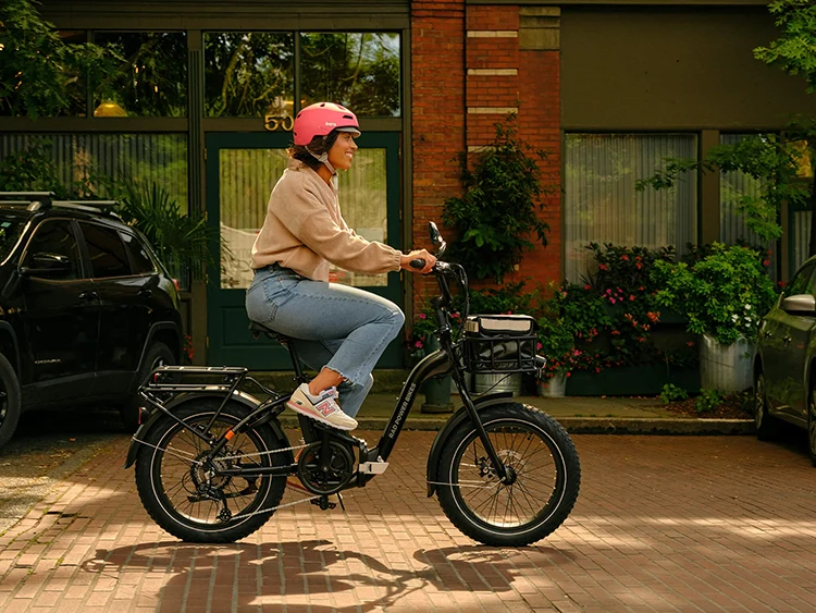 woman riding radexpand 5 electric folding bike in the city